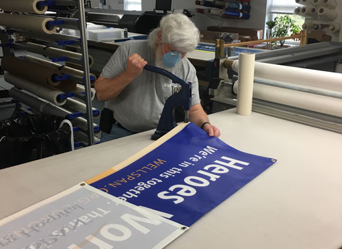 graphcom team creates covid-19 banners for clients