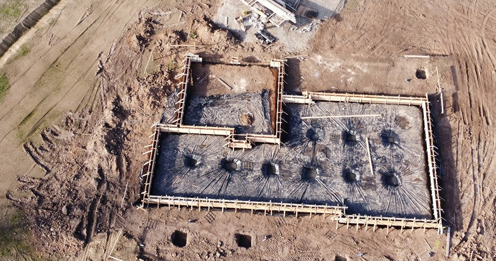 a bird's eye view of the foundation of a home on a property
