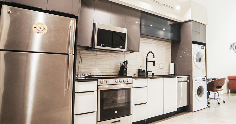 a sleek, modern kitchen with stainless steel appliances