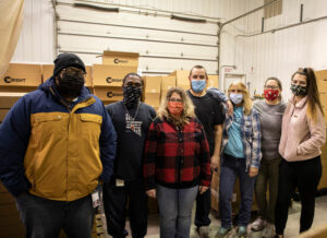 team who helped prepare boxes for shipping