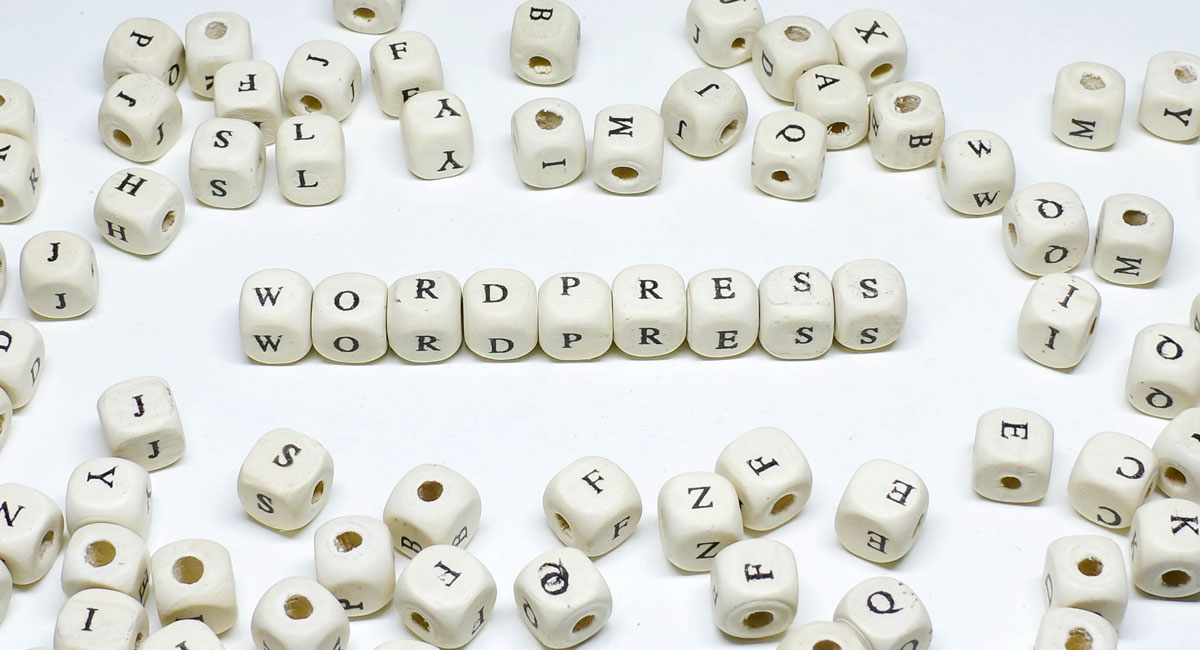 dice spelling out "wordpress"
