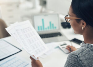 woman sorting through data