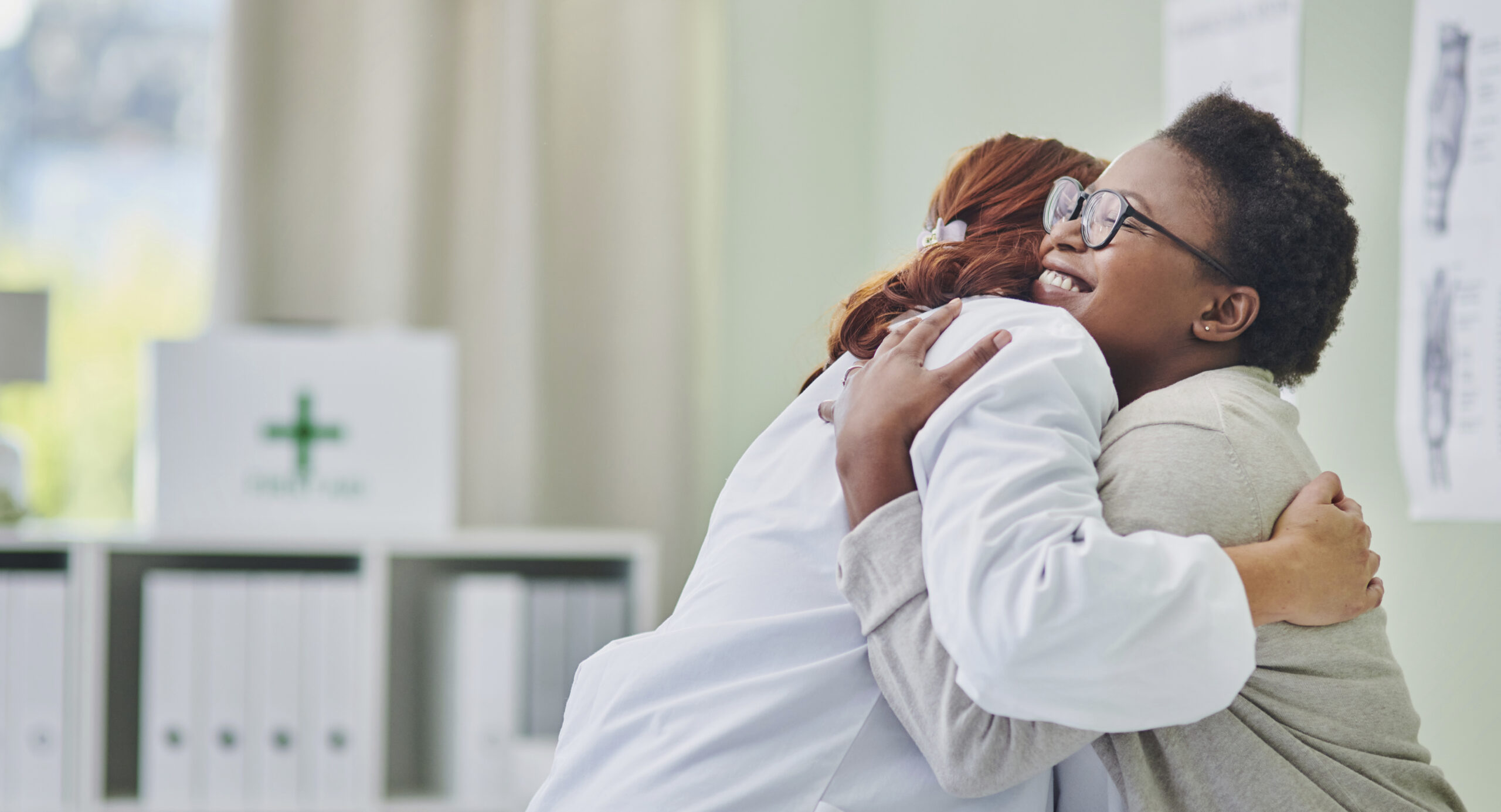 patient hugging a doctor