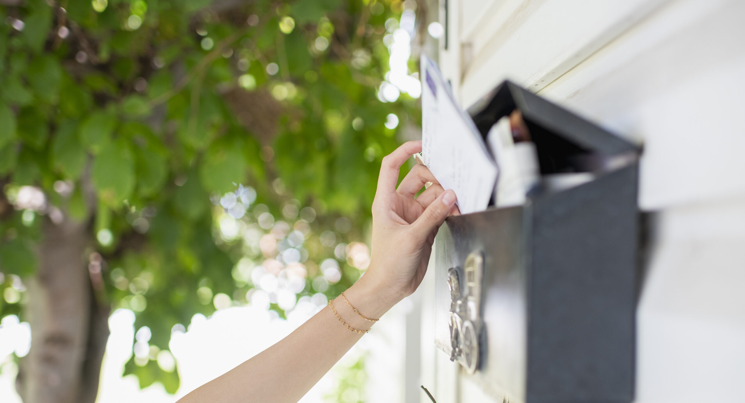 putting letter in mailbox